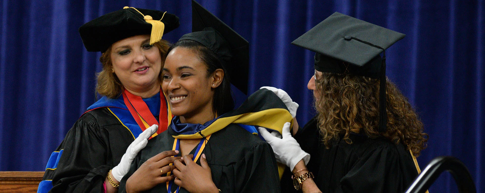 Graduating female student smiling